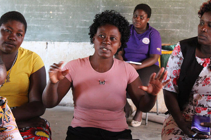 Women participating in a community dialogue